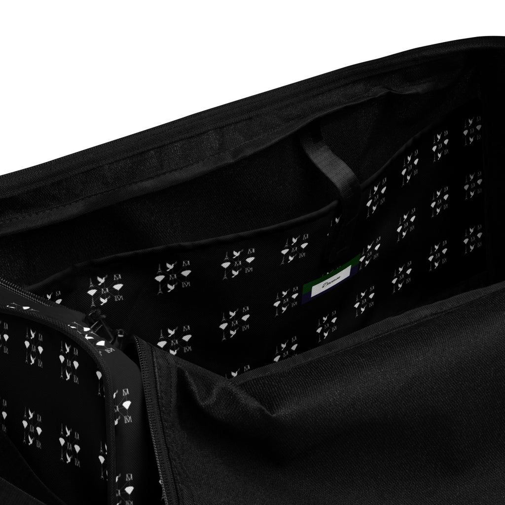 Daemon Makara Coroner duffle bag with all-over white print and interior pocket, designed for versatile travel and storage.