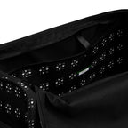 Daemon Makara Coroner duffle bag with all-over white print and interior pocket, designed for versatile travel and storage.