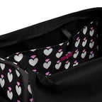 Frosted Hearts Nemesis Borsone duffle bag by Daemon Luxury with all-over white print and interior pocket.