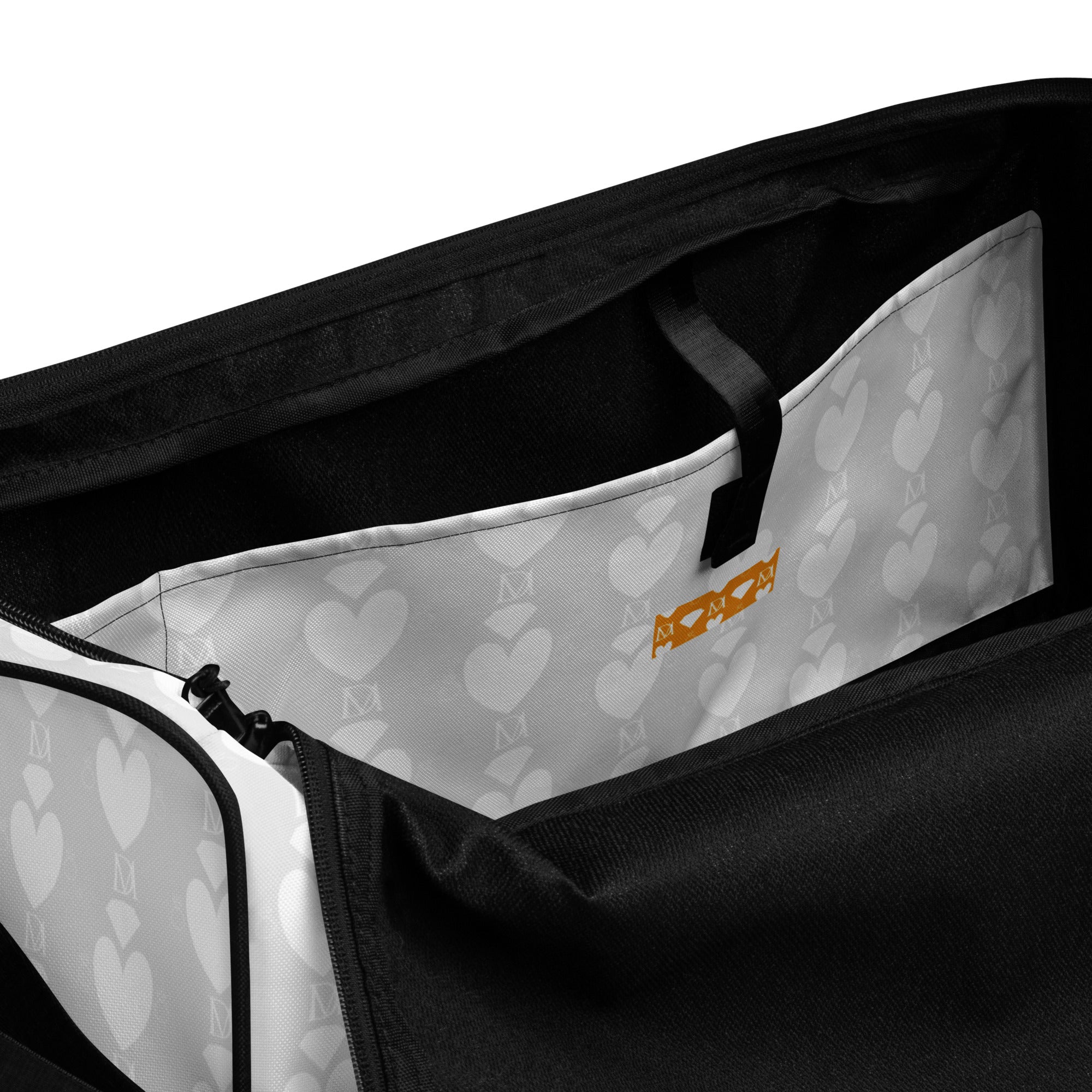 Frosted Heartfelt sunless self-tanning product by Daemon Luxury, with all-over print duffle bag featuring white inside pocket.