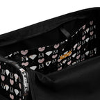 Southgate Treasured Borsone from Daemon Luxury, all-over print duffle bag with white interior pocket and spacious design.