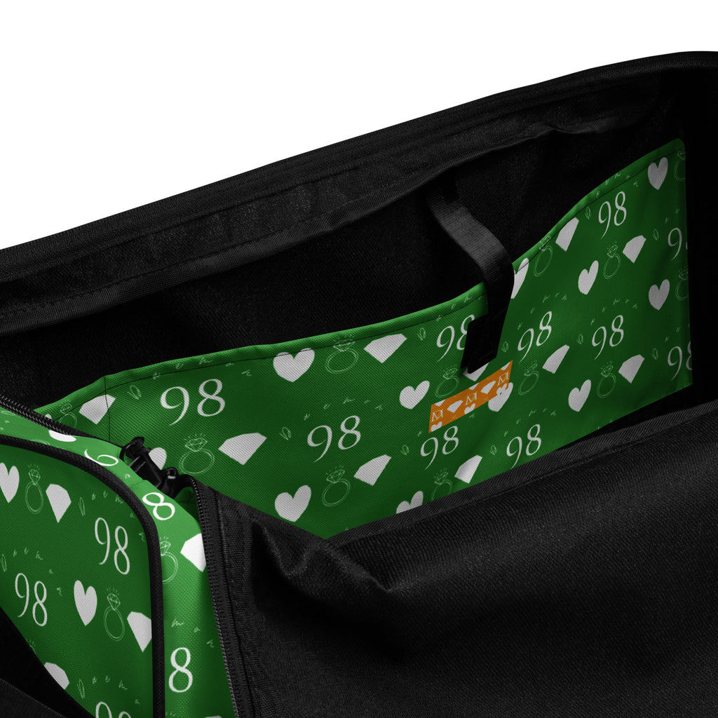 Daemon Luxury Belly Red’s Garden Borsone duffle bag with all-over floral print and white interior pocket for travel and gym use.