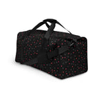 Daemon Luxury Speckled Diamonds NEMESIS duffle bag with all-over white and black speckled diamond pattern and sturdy handles.