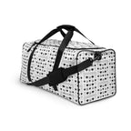 Daemon Luxury Dim Diamonds Artica Nero duffle bag with all-over black and white print, featuring sturdy handles and spacious design.