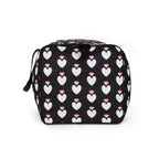 White all-over-print duffle bag with frosted hearts design from Daemon Luxury Nemesis Borsone collection, showing left side detail.