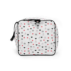 Daemon Luxury Speckled Diamonds Artica Blizzard Borsone duffle bag with all-over white and black diamond pattern, side view.