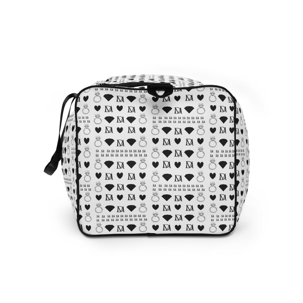 Daemon Luxury Dim Diamonds Artica Nero duffle bag with all-over black and white diamond pattern, side view showing handles and design.