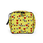 Daemon Luxury Foreigners Luv Solar Butter all-over-print duffle bag in white, showcasing the vibrant design on the left side.
