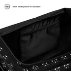 Daemon Makara Coroner duffle bag with all-over white print, showcasing its spacious design and detailed pattern.