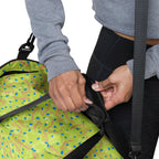 Daemon Luxury Picasso Mirrors Borsone duffle bag with all-over white print, featuring a spacious design for travel and storage.