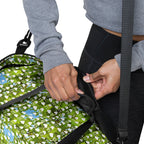 Daemon Luxury Belly Red’s Garden (Rebirth) Borsone duffle bag with all-over floral print on white fabric, stylish and spacious.