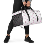 White Artica Frosted Hearts Borsone duffle bag by Daemon Luxury with all-over heart print, right-front view.
