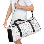 Daemon Luxury Speckled Diamonds Artica Blizzard duffle bag with all-over white and diamond pattern, right front view.