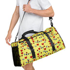 Daemon Luxury Foreigners Luv Solar Butter all-over-print duffle bag in white, right-front view showing vibrant design and sturdy handles.