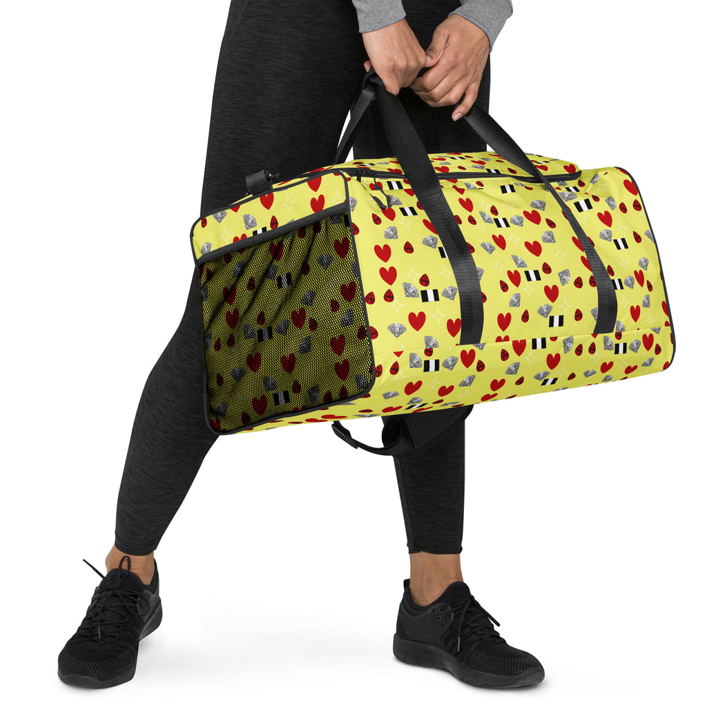 Daemon Luxury Foreigners Luv Solar Butter all-over-print duffle bag in white, showing right front view with vibrant design.
