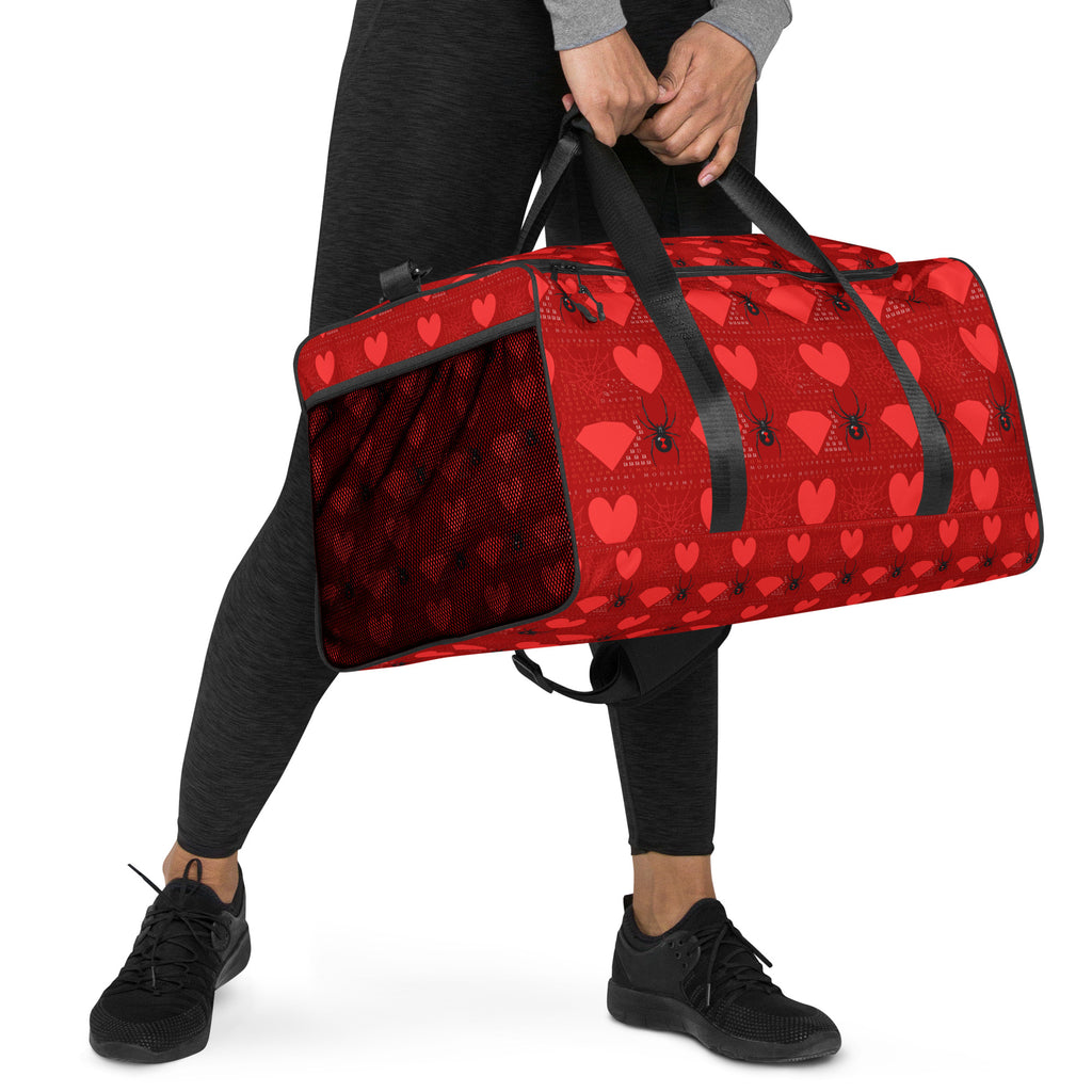 Daemon Luxury Supreme Models Borsone duffle bag with all-over print, white fabric, right front view showing design details.