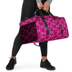 Heartfelt STF Little Magenta Borsone duffle bag by Daemon Luxury with all-over pink and white print, showing the front right view.