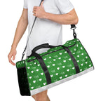Daemon Luxury Belly Red’s Garden Borsone duffle bag with all-over floral print on white background, right front view.