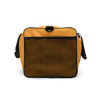 Daemon Luxury Makara Coroner all-over-print duffle bag with white background and side view, featuring detailed design and sturdy handles.