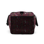 Daemon Luxury Carnival Bay Picasso Mirrors duffle bag with all-over white print, shown from the right side.