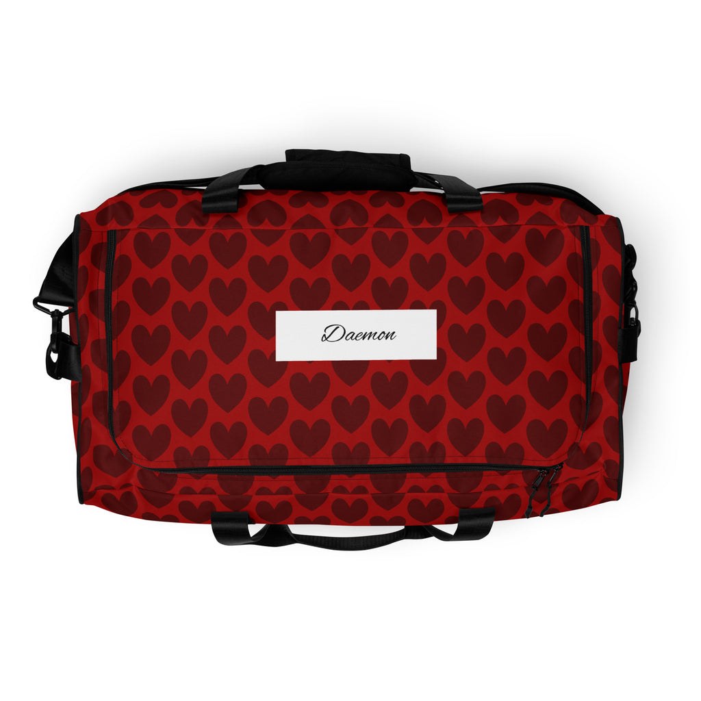 White all-over-print Heartfelt Borsone duffle bag by Daemon Luxury, featuring a sleek design and sturdy handles.
