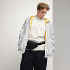 White Daemon Luxury Florette Rebirth windbreaker jacket with all-over floral print, men's lightweight windbreaker front view.
