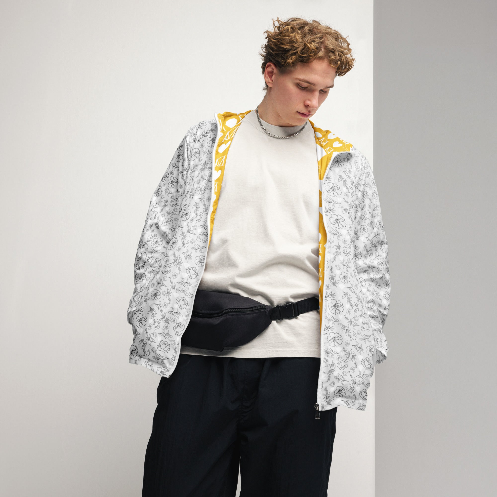 White Daemon Luxury Florette Rebirth windbreaker jacket with all-over floral print, men's lightweight windbreaker front view.