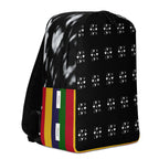 Daemon Makara Coroner SERPENTINE backpack with white all-over print and ruby stone accents, minimalist design, and adjustable straps.