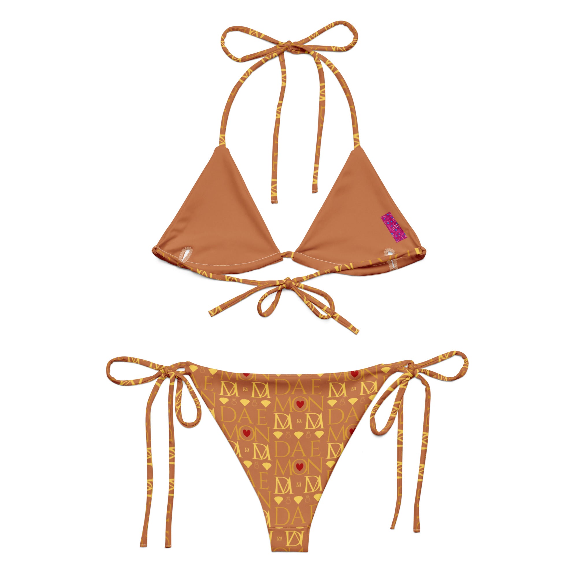Daemon Luxury Tarmin Dim Sun Glow Dulce Scusa recycled string bikini with all-over white print, shown from the back.