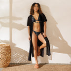 Daemon Luxury Frosted Diamonds Dolce Scusa recycled string bikini with all-over white print, front view showing fit and design.