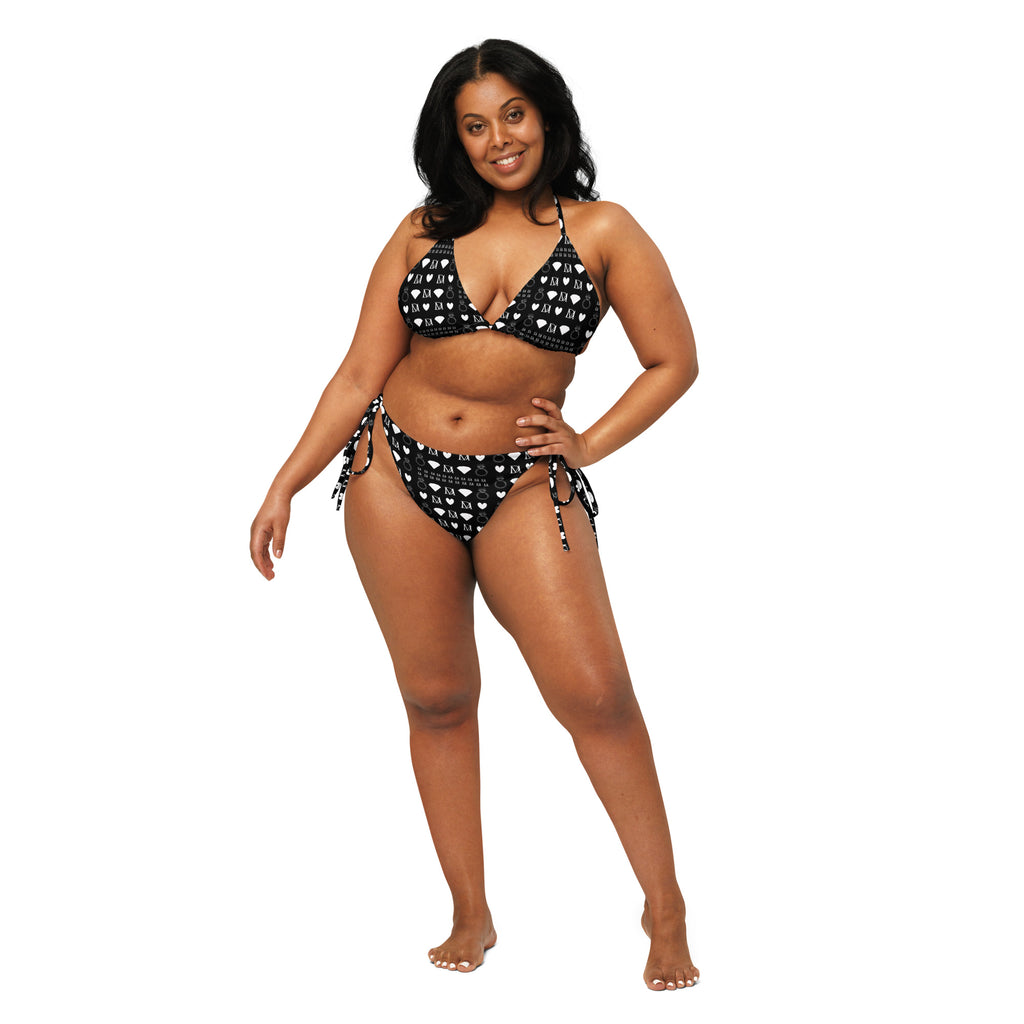 Daemon Luxury Frosted Diamonds Dolce Scusa recycled string bikini with all-over white print, front view showing intricate diamond pattern.