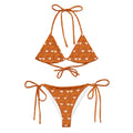 Daemon Luxury Gloomy Runner Honey Sesta Dolce Scusa recycled string bikini with all-over white print, front view.