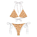 Daemon Luxury Florette Rebirth Sienna Dulce Scusa recycled string bikini with all-over white print, front view.