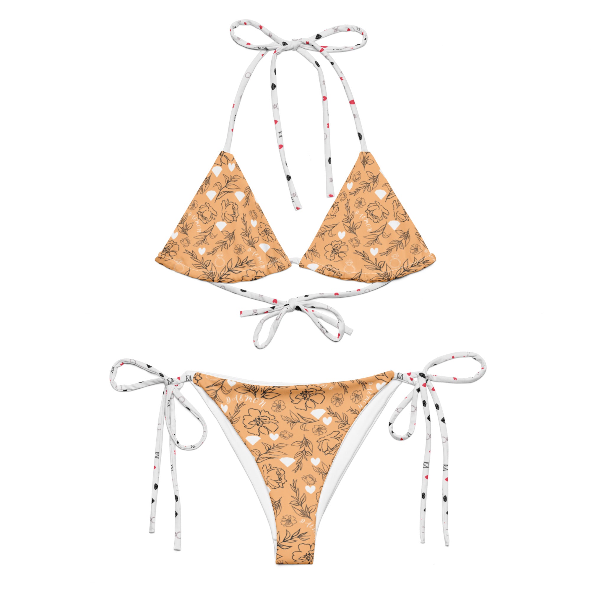 Daemon Luxury Florette Rebirth Sienna Dulce Scusa recycled string bikini with all-over white print, front view.