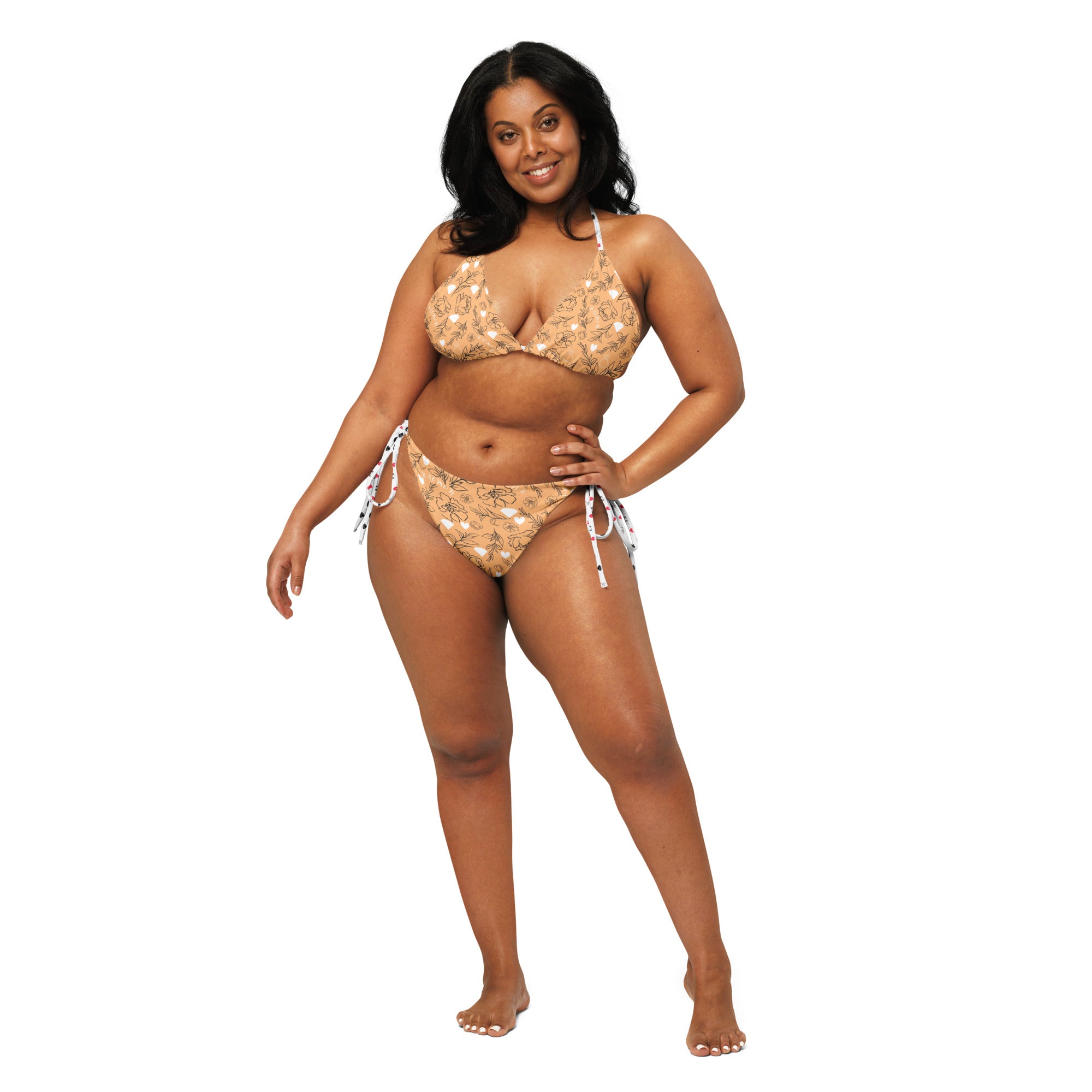 Daemon Luxury Florette Rebirth Sienna Dulce Scusa recycled string bikini with white all-over print, front view.