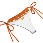 Daemon Luxury Gloomy Runner .Honey Sesta all-over-print recycled string bikini with white design, detailed close-up of the swimwear.