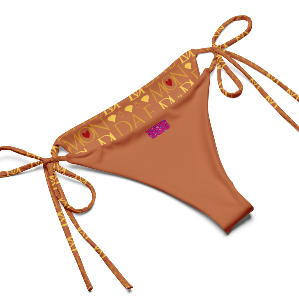 Daemon Luxury Tarmin Dim Sun Glow Dulce Scusa all-over-print recycled string bikini in white, shown from the front.