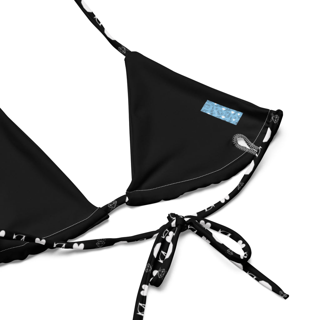 Recycled string bikini by Daemon Luxury with frosted diamond all-over print in white, showcasing the swimwear's detailed pattern and fabric.