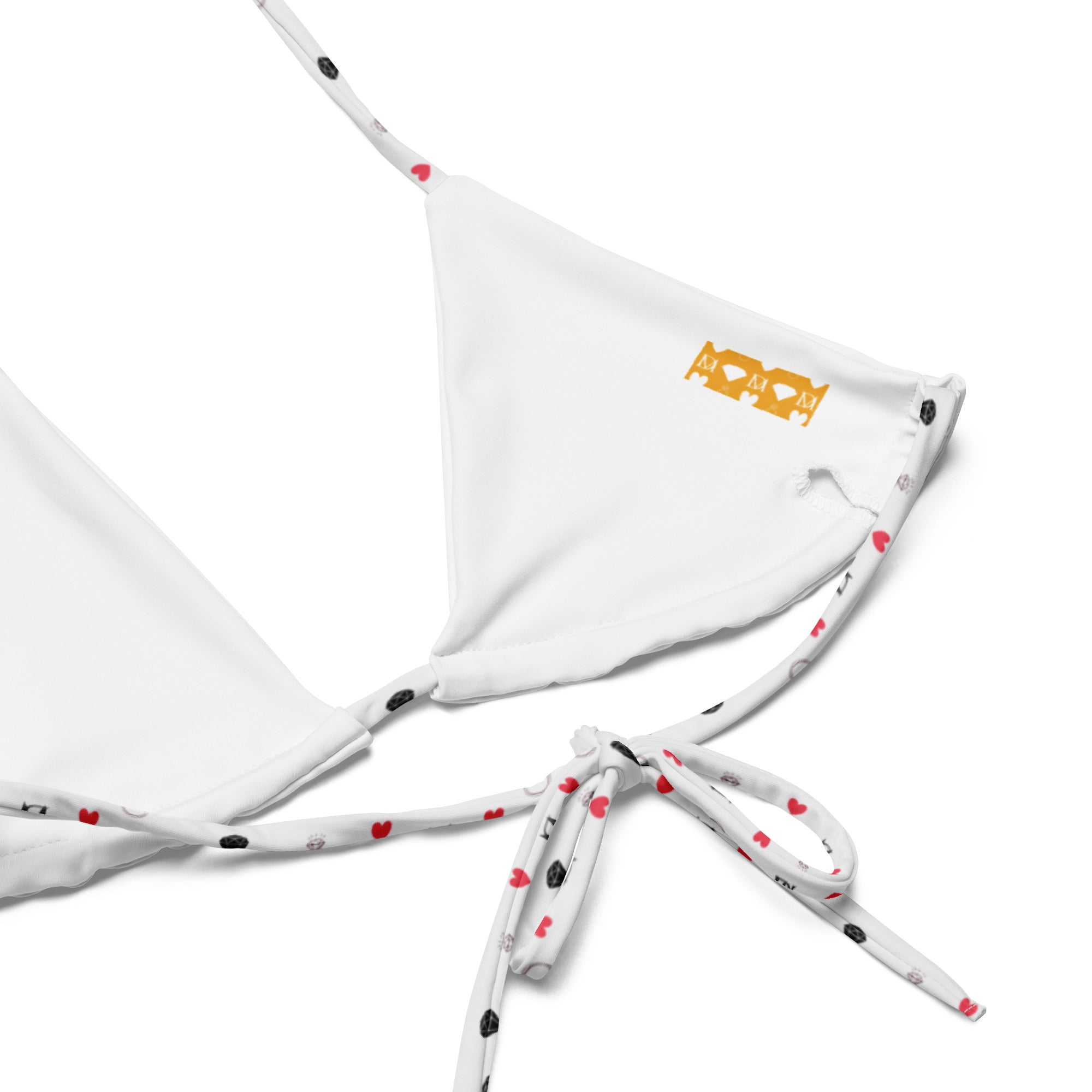 Daemon Luxury Florette Rebirth Sienna Dulce Scusa recycled string bikini with all-over white print, designed for stylish beachwear.