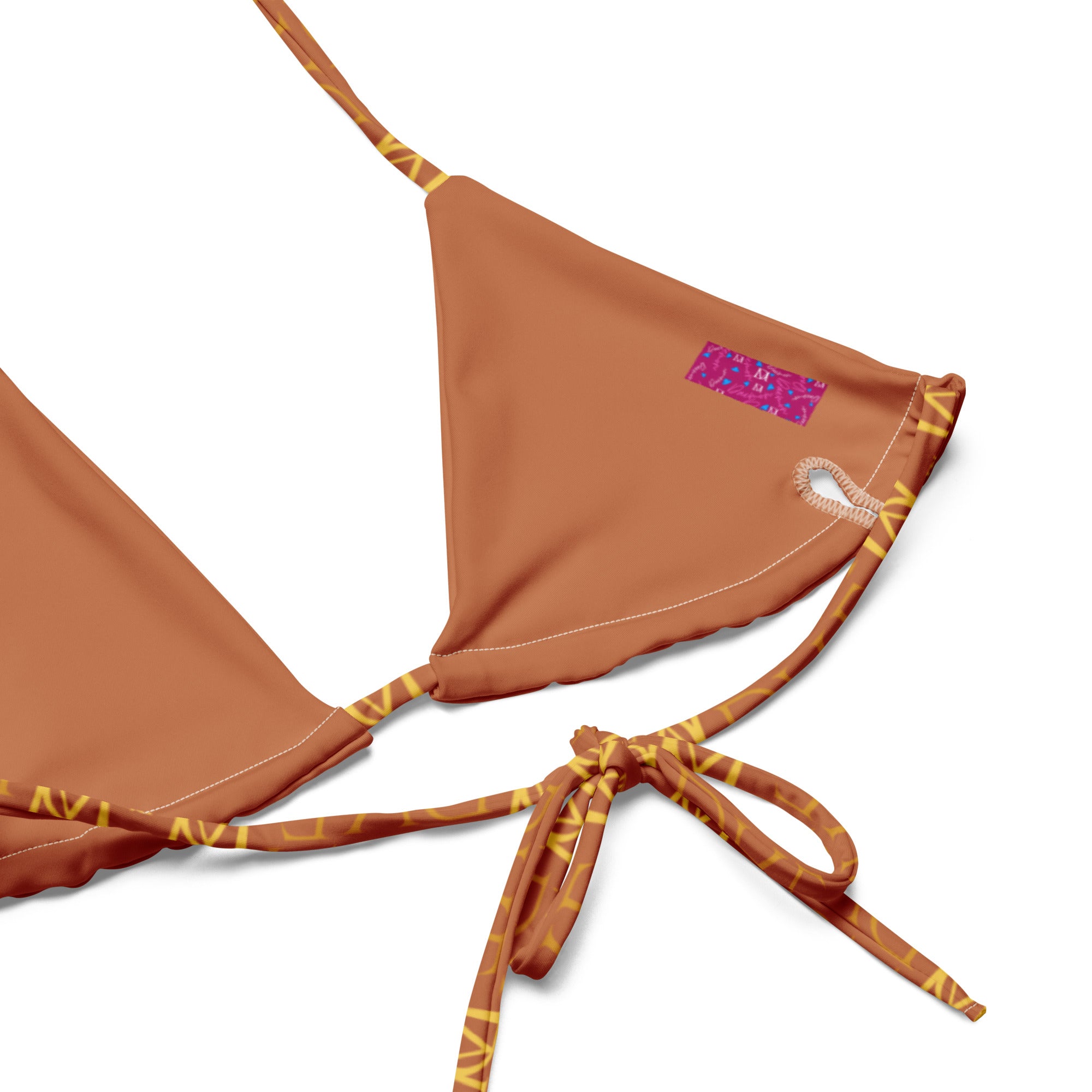 Daemon Luxury Tarmin Dim Sun Glow Dulce Scusa all-over-print recycled string bikini in white, featuring vibrant sun-inspired design.