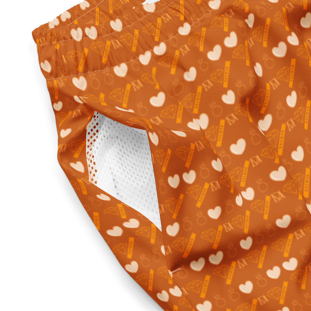Daemon Luxury Gloomy Runner Honey swim trunks with all-over recycled print, featuring a stylish and eco-friendly design.