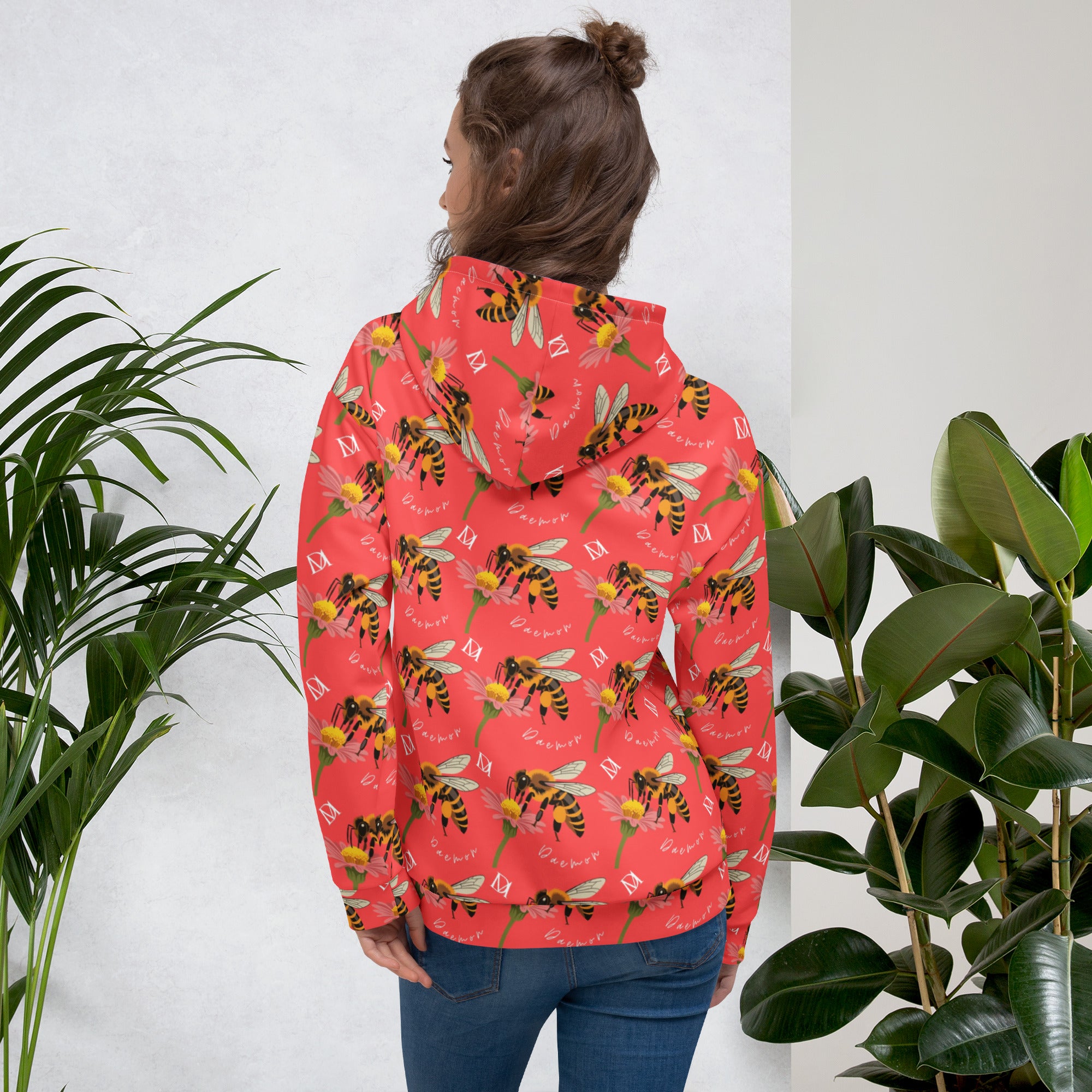 Daemon Luxury Honeybee Shores unisex hoodie with all-over print, recycled fabric, white background and hood detail.