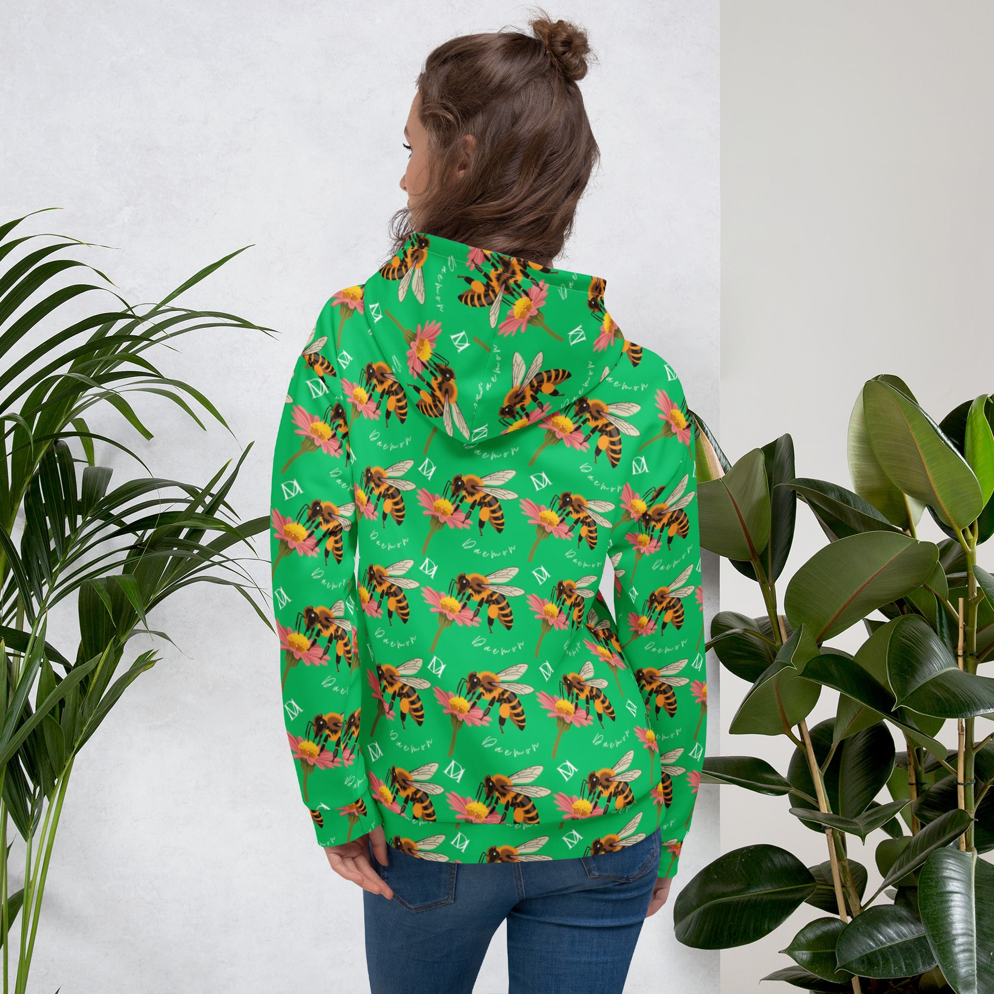 White recycled unisex hoodie featuring all-over print of Honeybee Shores (Lucky Charm) design by Daemon Luxury.