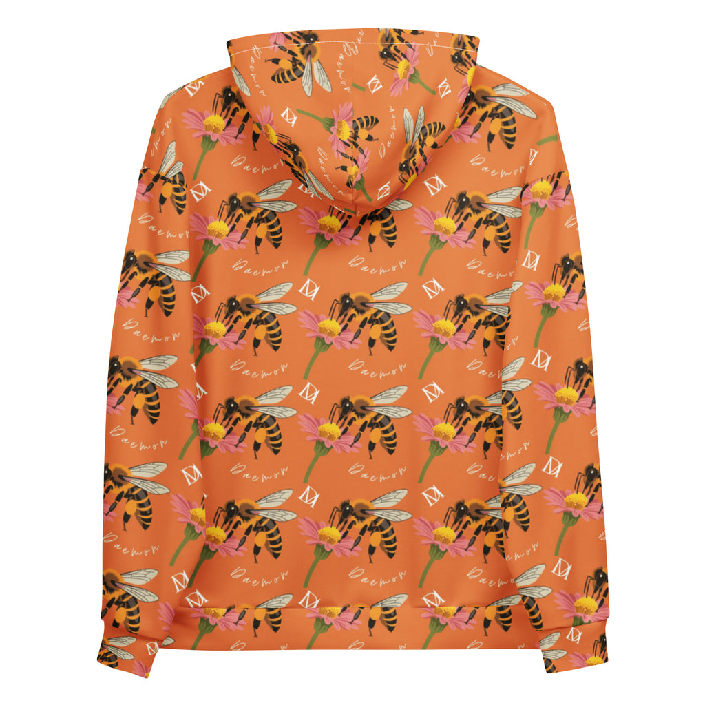 Unisex white hoodie from Daemon Luxury with all-over print of Honeybee Shores (Golden Hour) design, featuring a front pocket and hood.