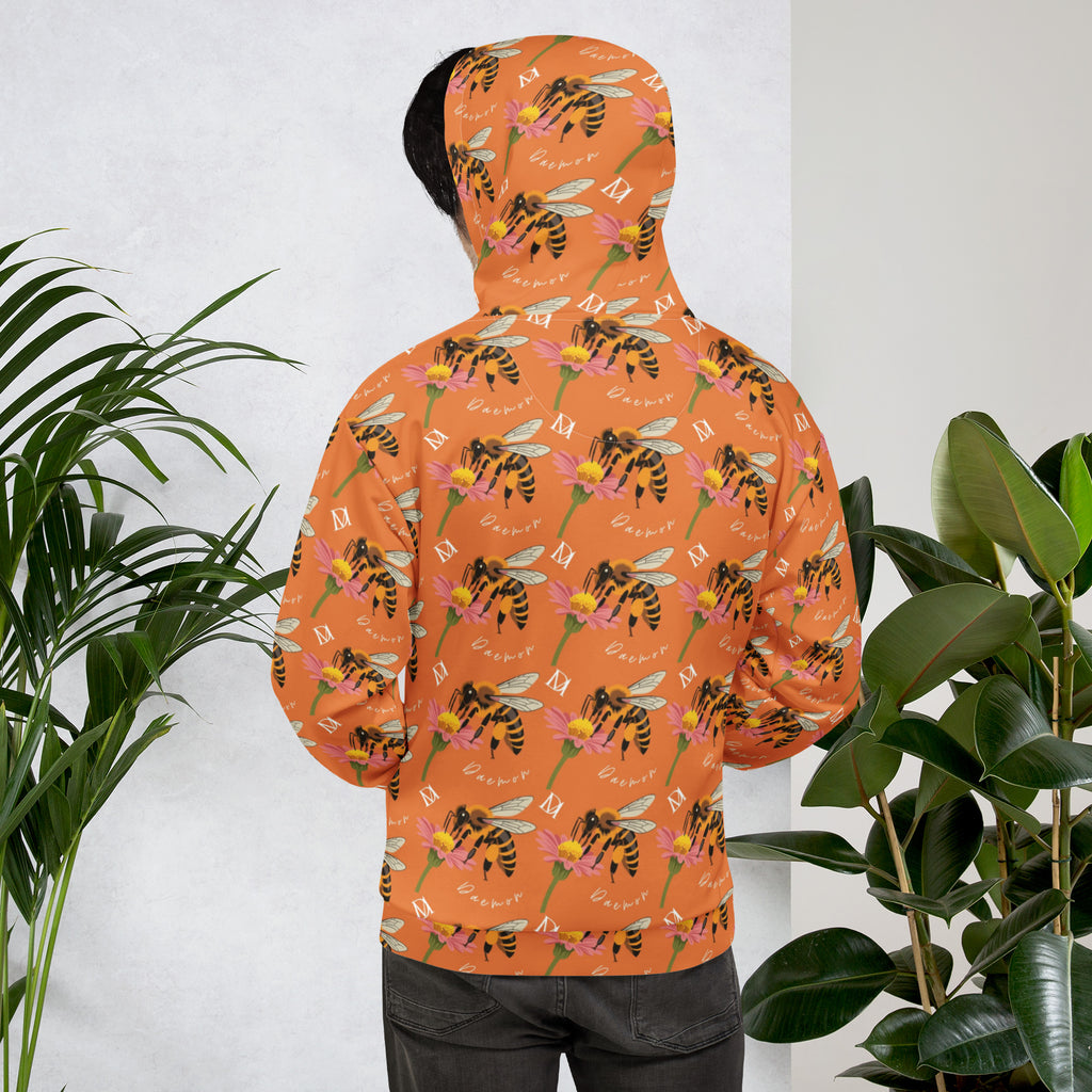 Unisex white recycled hoodie with all-over honeybee shores golden hour print by Daemon Luxury, featuring a hood and front pocket.