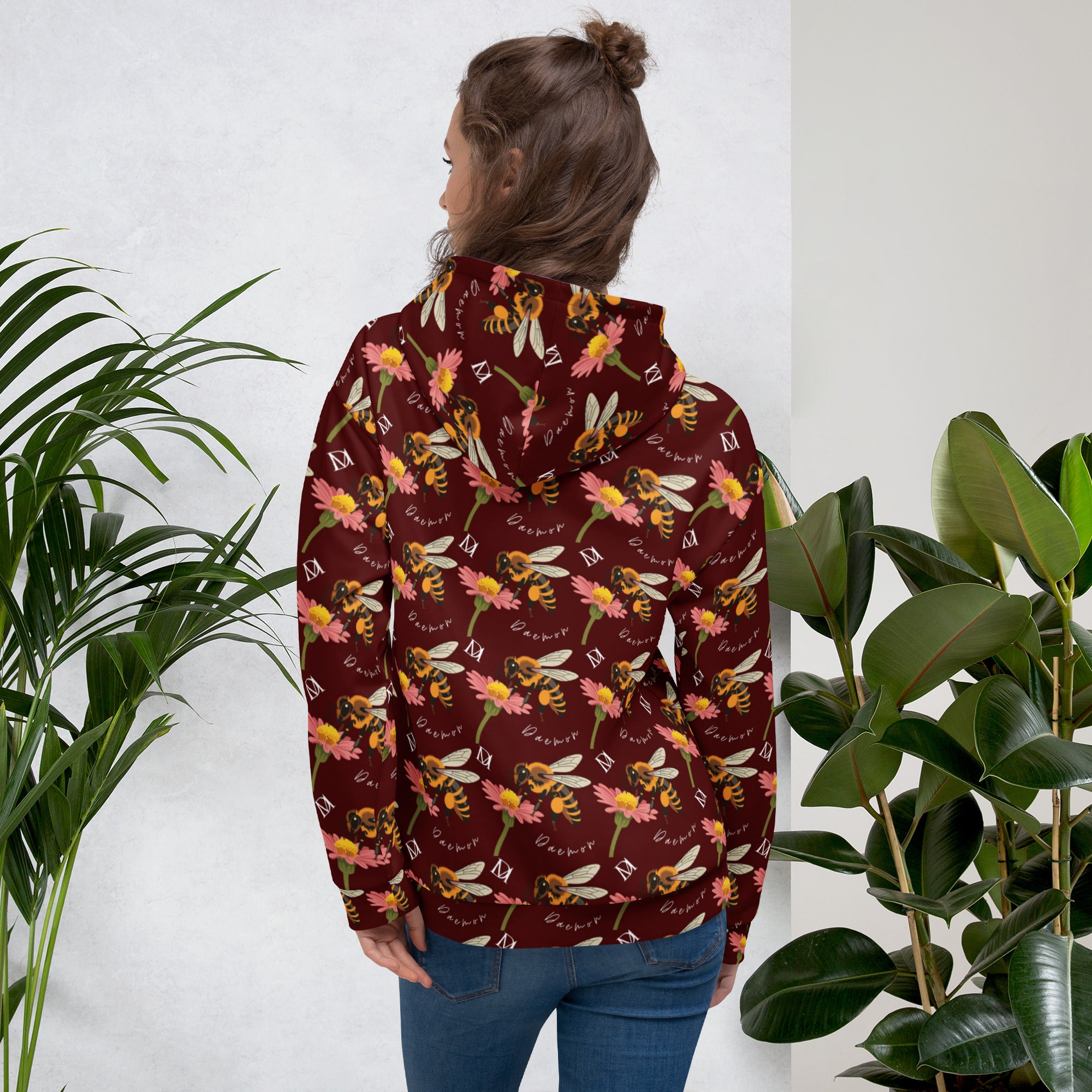 White recycled unisex hoodie featuring an all-over Honeybee Shores (Gardena Dawn) print by Daemon Luxury, with a hood and casual fit.