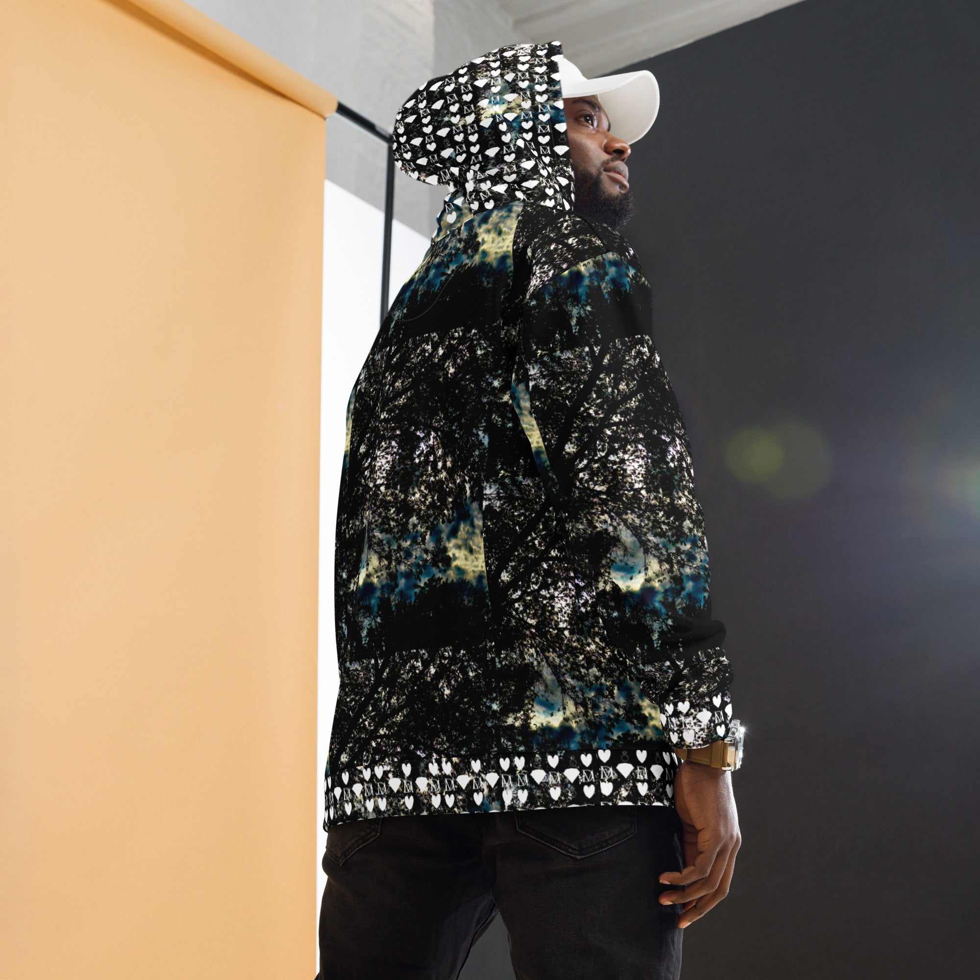 Unisex white hoodie with stitched frames and all-over Panther Canyon print by Daemon Luxury, featuring a front pouch pocket and drawstring hood.