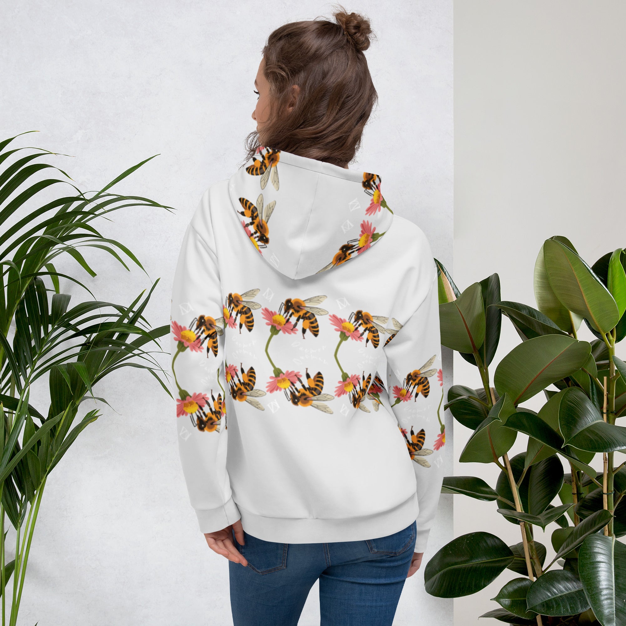 Recycled white unisex hoodie with all-over honeybee shores dusk print by Daemon Luxury, featuring a ribbed design and hood.