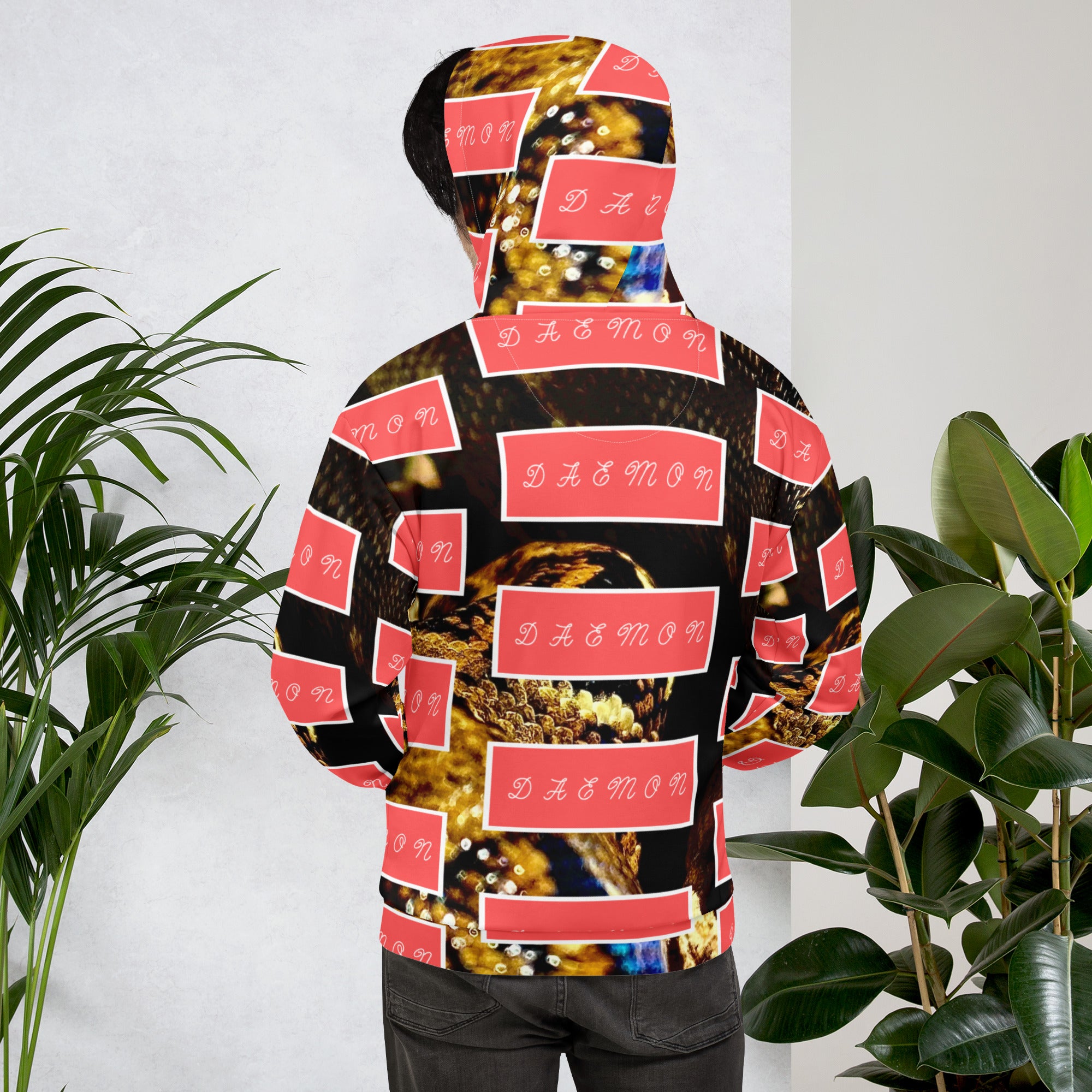 Recycled white unisex hoodie with all-over serpentine Nicaragua print by Daemon Luxury, showing back view.