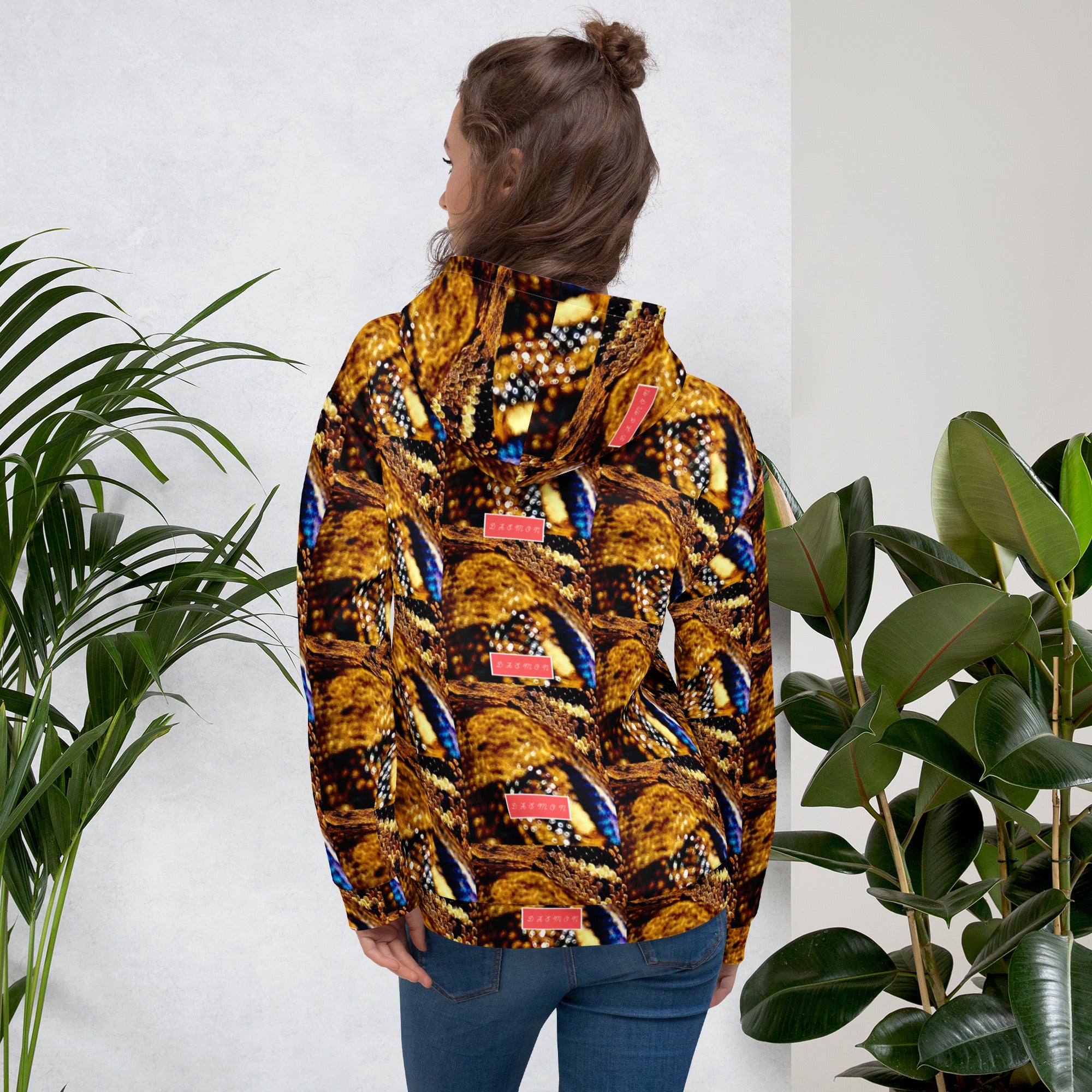 Recycled white unisex hoodie with all-over serpentine Nicaragua print from Daemon Luxury, featuring a hood and casual fit.